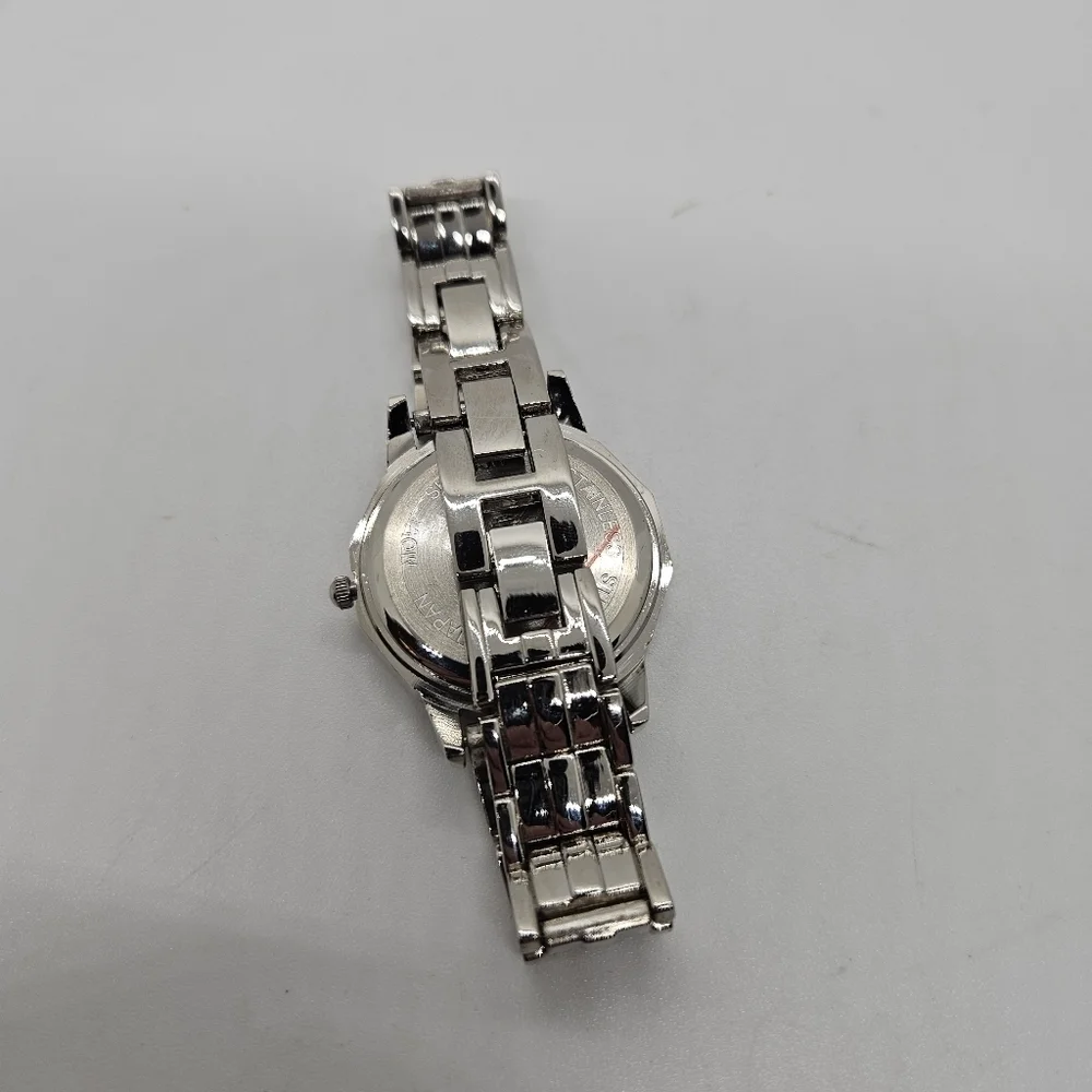 silver tone watch with rhinestone digits